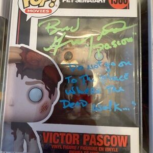 Funko Pop Victor Pascow Figure with Red and Brown Accents